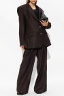 The Mannei BROWN ‘Jafr’ pleat-front trousers