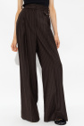 The Mannei BROWN ‘Jafr’ pleat-front trousers