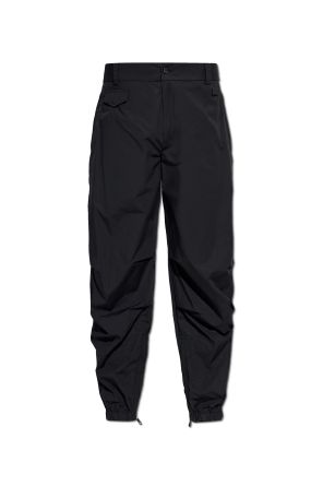 Pants with sewn-in zippers in the legs