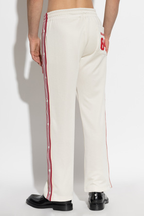 Dolce & Gabbana Cream-Red Track Pants with Embroidered Logo by Dolce & Gabbana