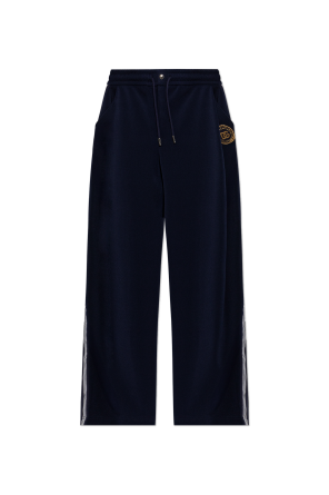 Trousers with appliqué