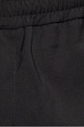 Etudes ‘Romance’ pleat-front Nero trousers