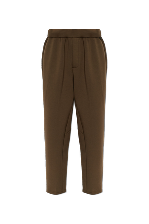 Brown Nike track pants in a dark olive-brown shade
