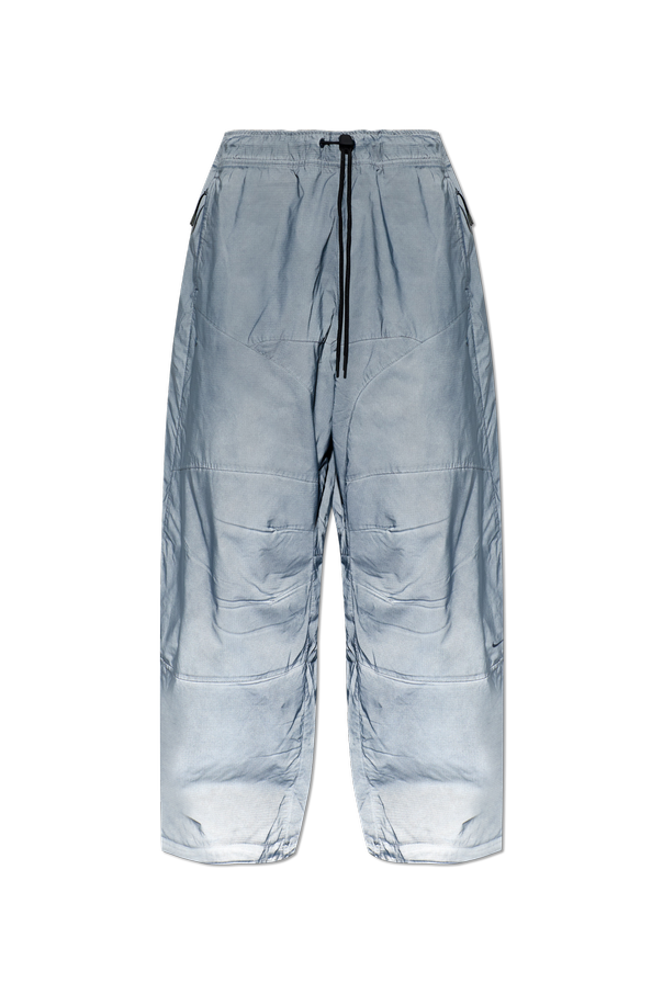 Reflective-effect trousers od Nike