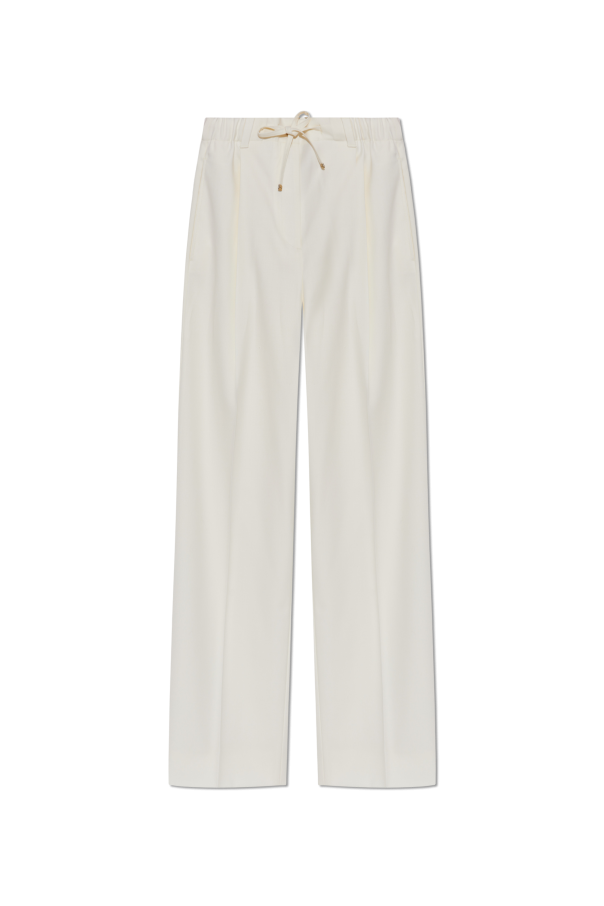 Creased trousers od Moncler