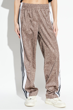 ADIDAS Originals Pantalones deportivos con estampado animal