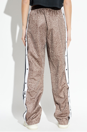 ADIDAS Originals Pantalones deportivos con estampado animal