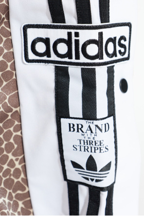 ADIDAS Originals Pantalones deportivos con estampado animal