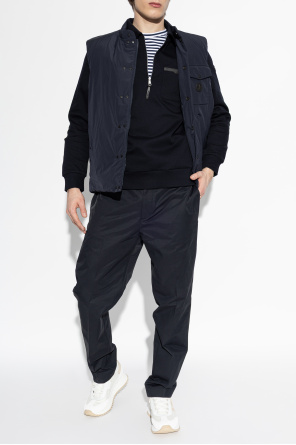 Creased trousers od Moncler