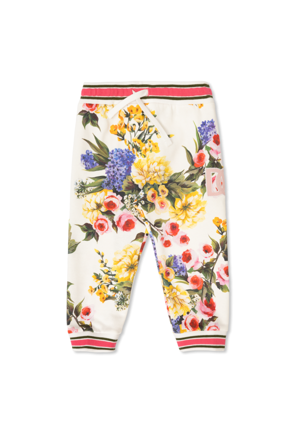 Jogging pants with floral motif od Ties / bows