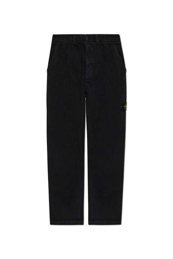 Jeans with logo patch od Stone Island