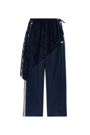 Tracksuit trousers with a lace skirt