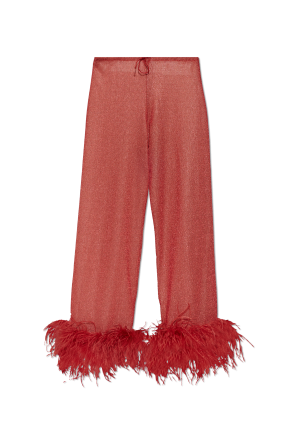 Pantalones con plumas