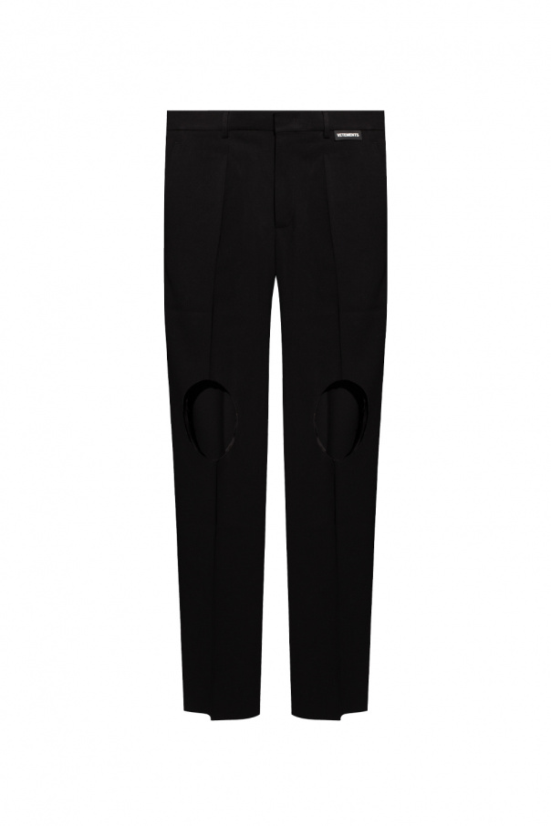 VETEMENTS trousers check with cut-outs