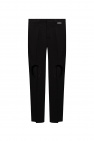 VETEMENTS trousers check with cut-outs