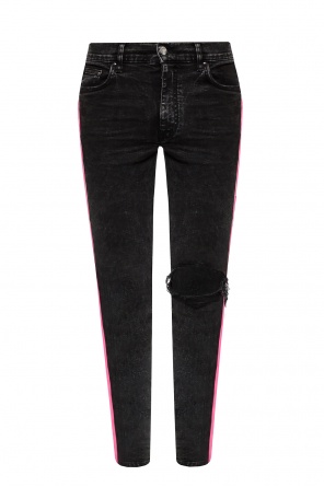 Jeansy z lampasami od Amiri