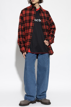 Jeansy z efektem `vintage` od VETEMENTS