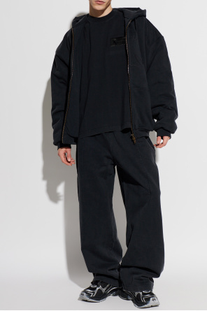 Spodnie dresowe z efektem `vintage` od VETEMENTS