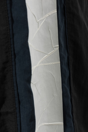 VETEMENTS Nylon track pants with side stripes