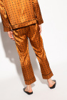 MCM julia fox diesel bandeau gold leather boot pants milan fashion week