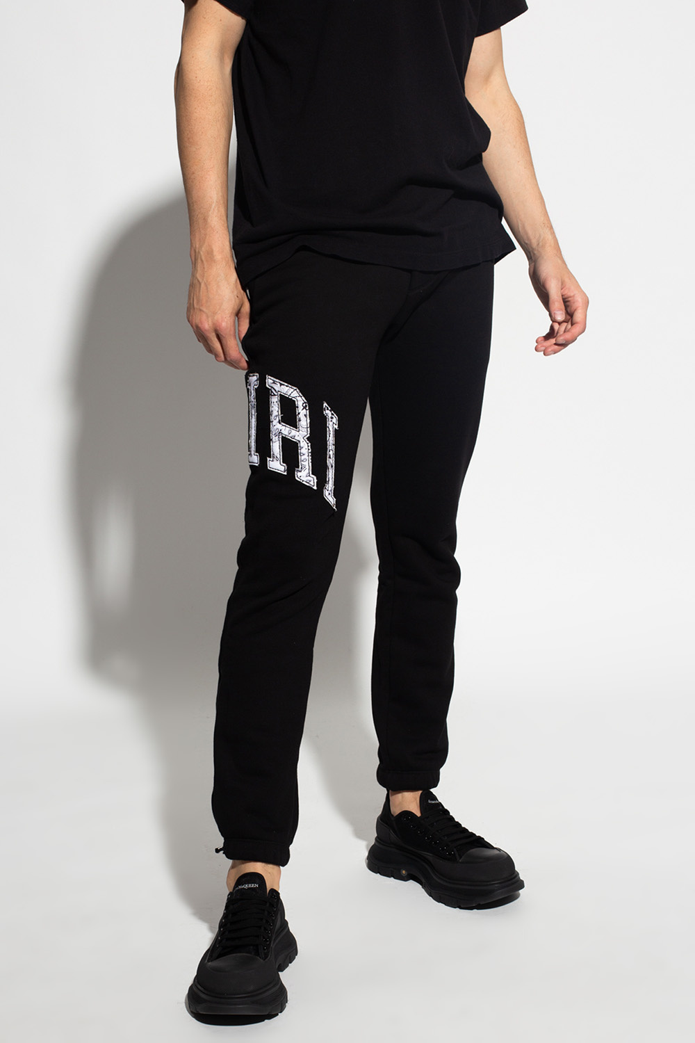 Amiri Givenchy label patch panel jeans