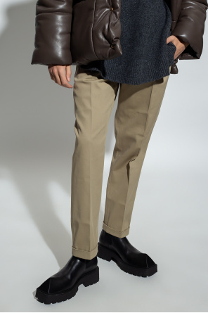 Nanushka ‘Jun’ pleat-front one-shoulder trousers