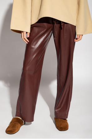 Nanushka ‘Calie’ trousers Peaches in vegan leather