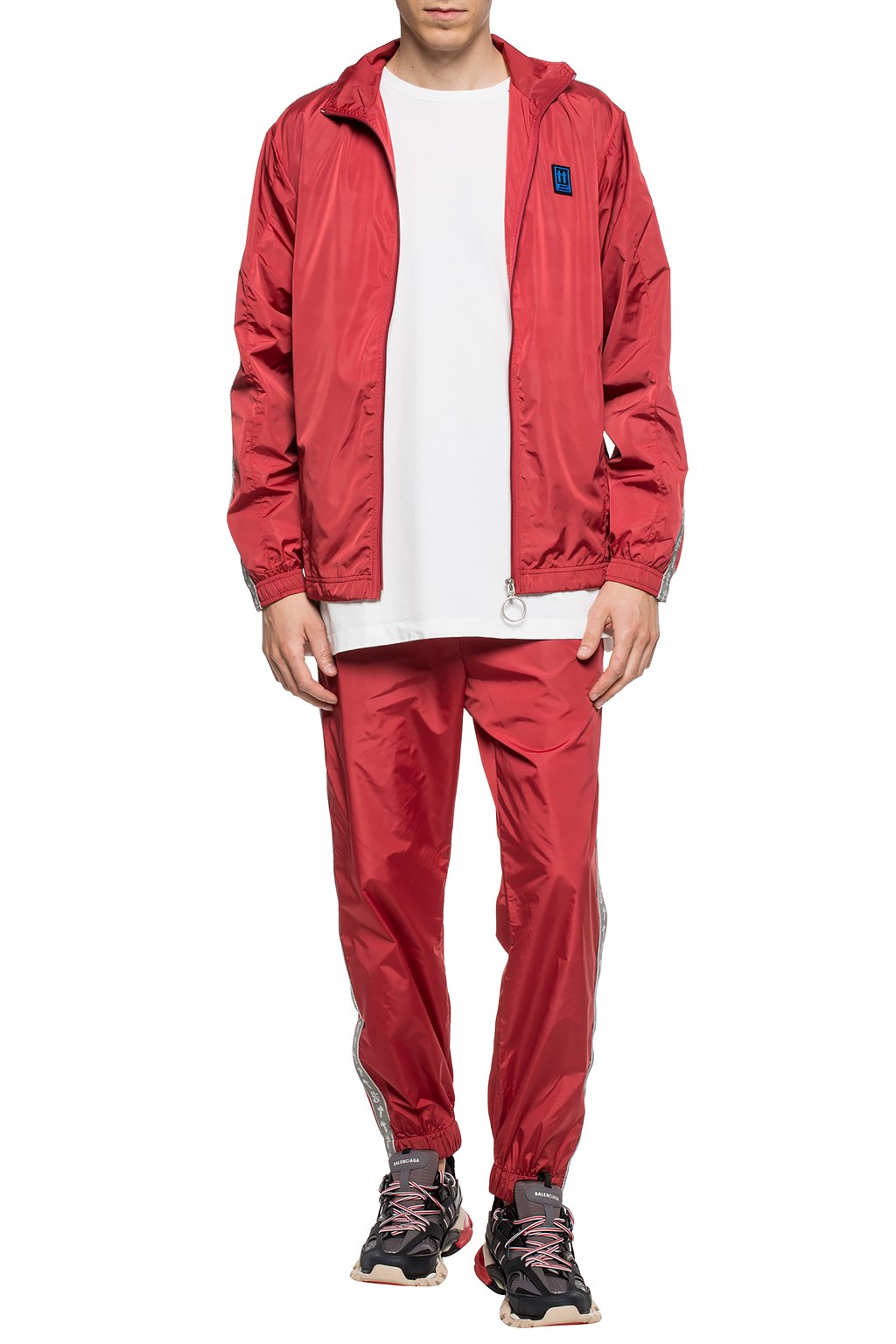 red sweatpants with white stripe