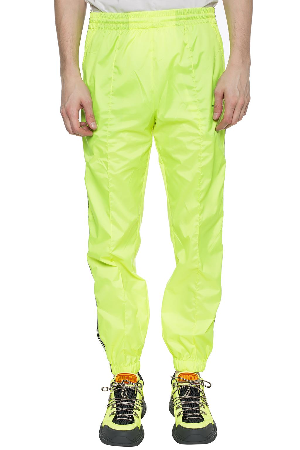 off white pants with yellow stripe