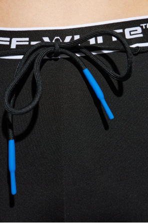 Off-White Flared trousers with a slit