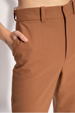 Aeron ‘Jamuna’ pleat-front trousers