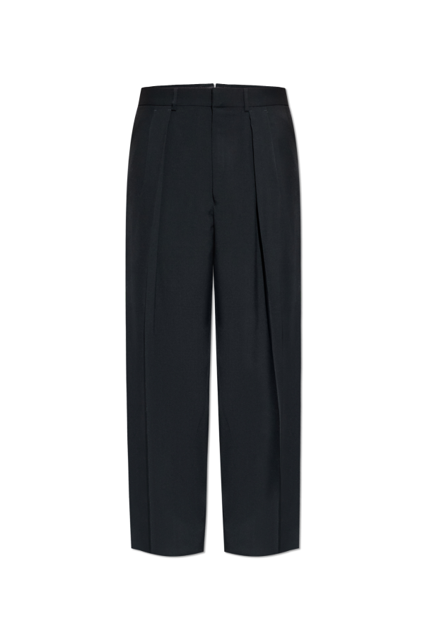 Creased trousers od Tom Ford