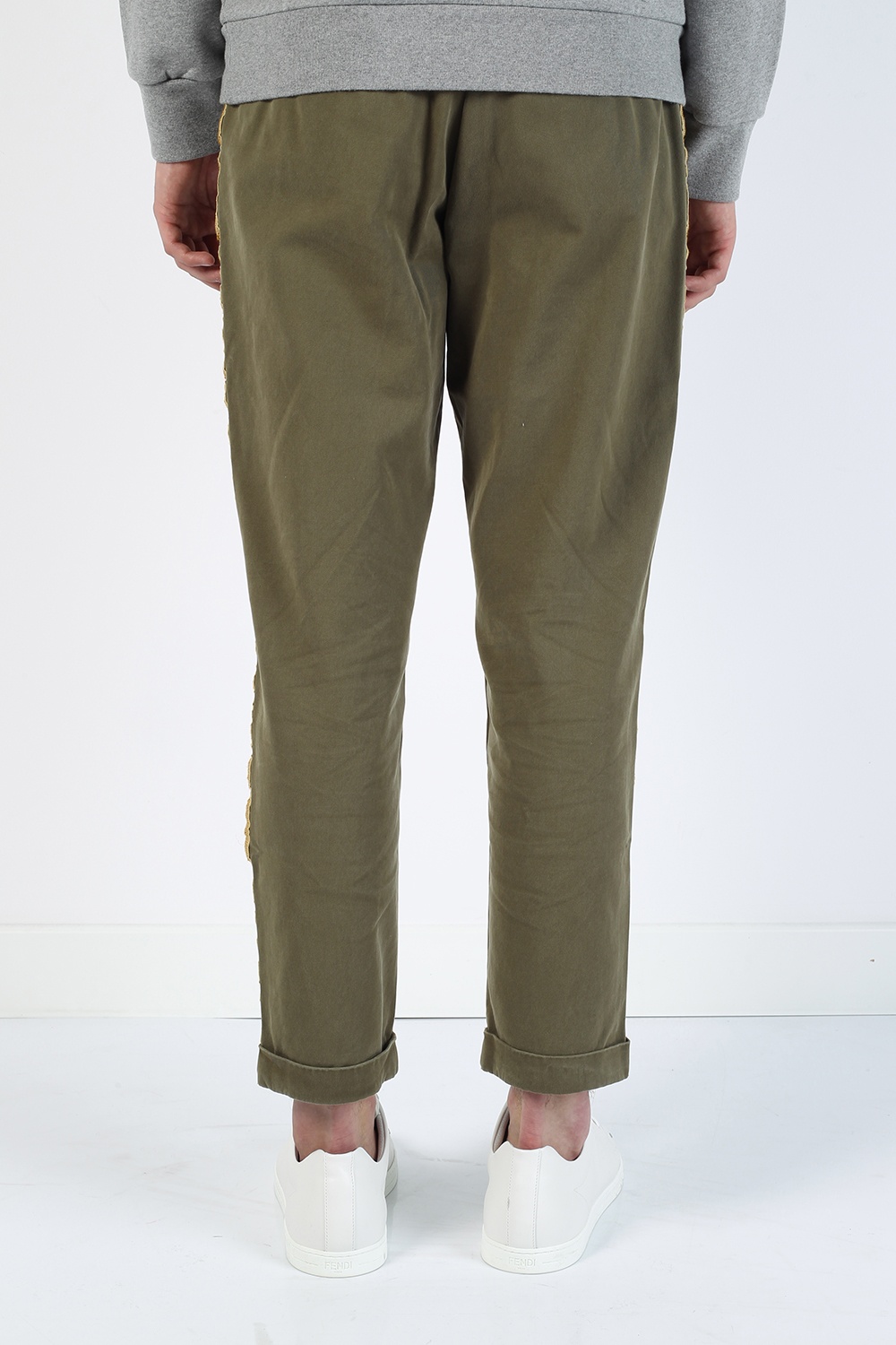 gold side stripe trousers