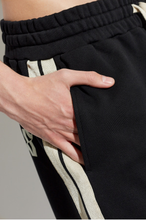 Palm Angels Pantalones de chándal de pierna ancha