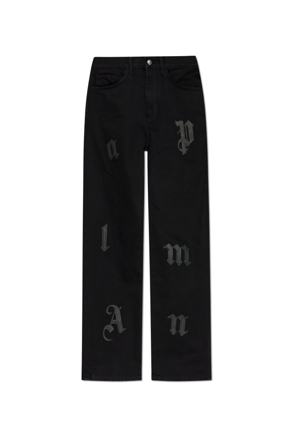 Jeans with patches od Palm Angels