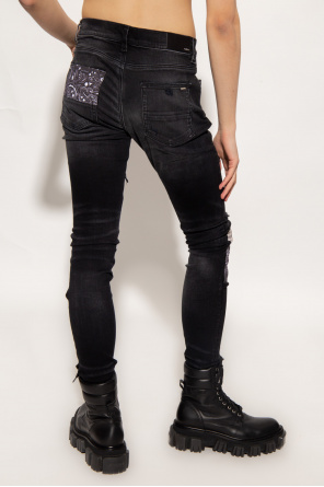 Amiri Distressed skinny jeans