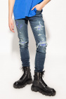 Amiri Distressed skinny jeans