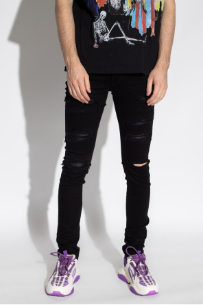 Amiri Jeans with leather inserts