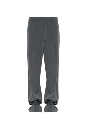 Pressed trousers with tie hems
