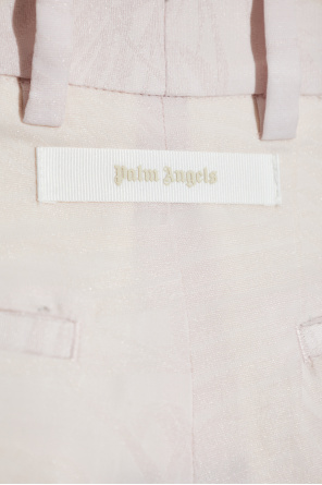 Palm Angels Spodnie z motywem kwiatowym