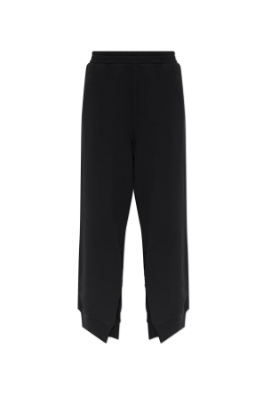 Pantalones deportivos con abertura en las perneras