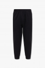 90s-inspired look with these chic black Icon pants from