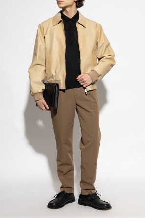 Pants with rolled-up legs od Tom Ford