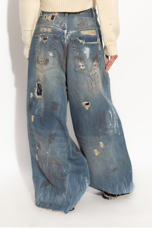 VETEMENTS Jeans with a destruction effect