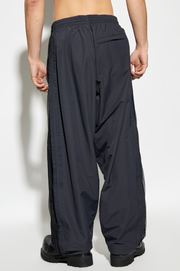 VETEMENTS Pantalones terminados con bajo ajustable