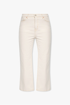 High-waisted jeans od fish-print cotton shirt