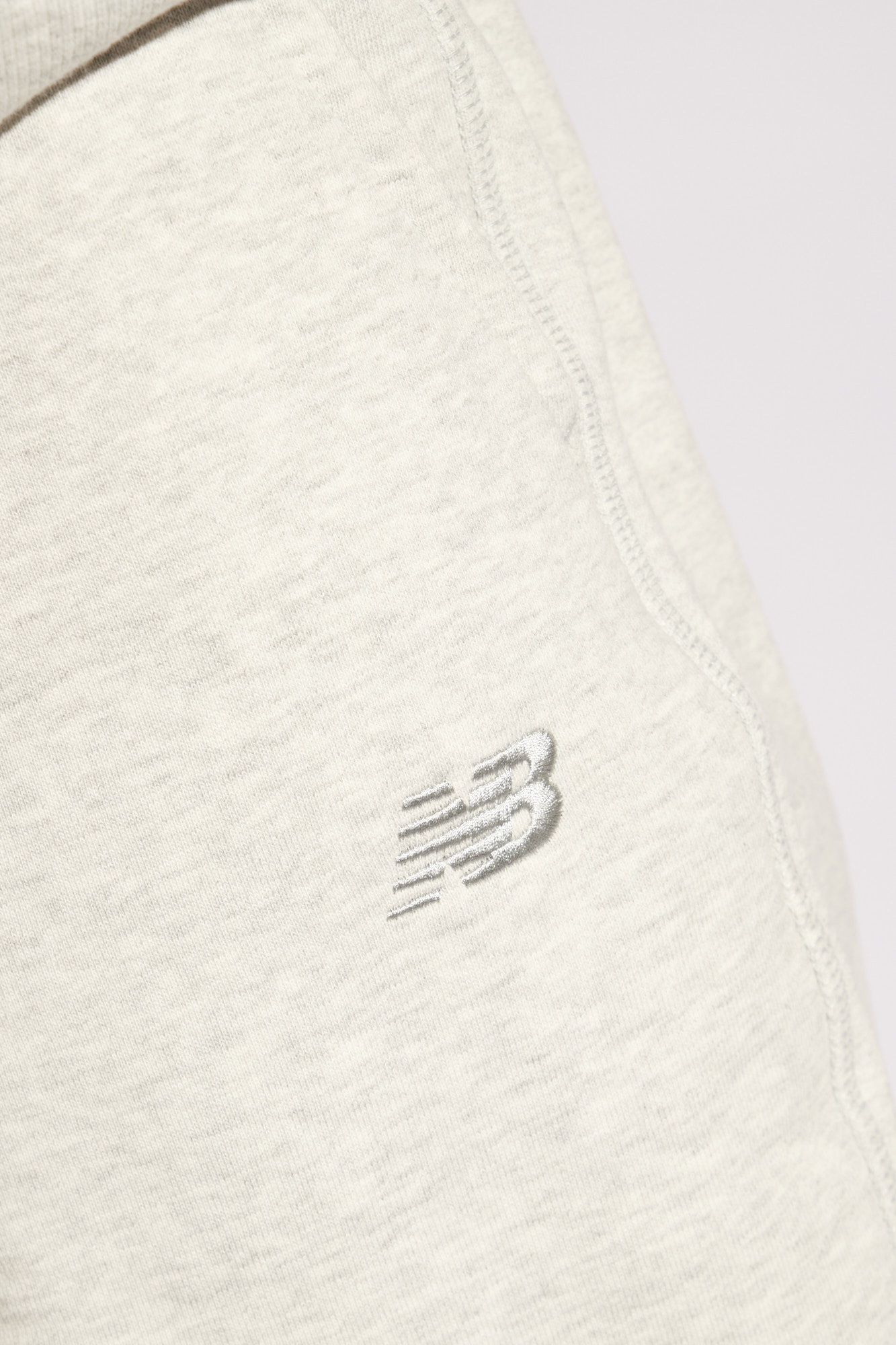 New Balance Spodnie dresowe z logo