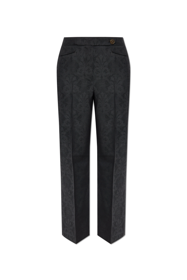 Etro Creased trousers with decorative pattern