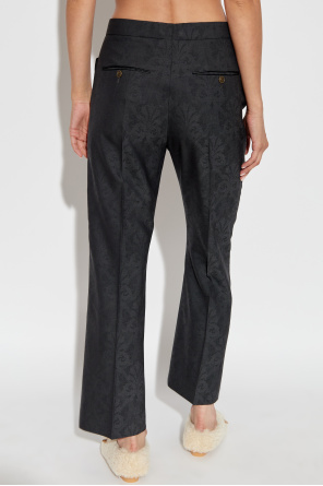 Etro Creased trousers with decorative pattern