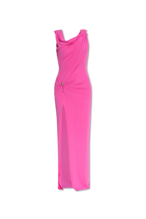 Dress with decorative safety pin and draping